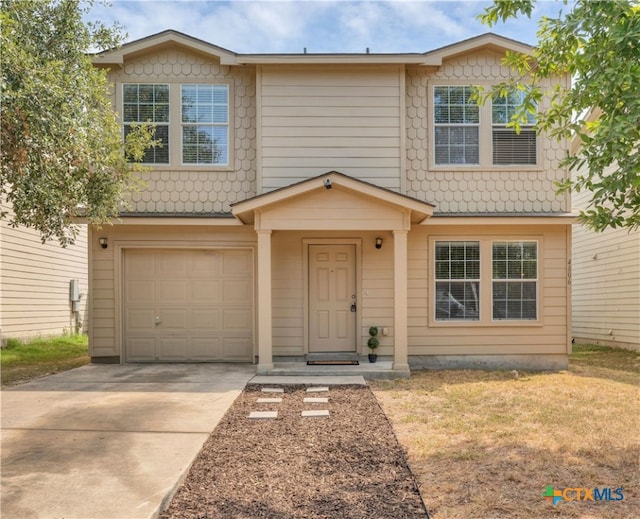 view of front of property featuring a garage