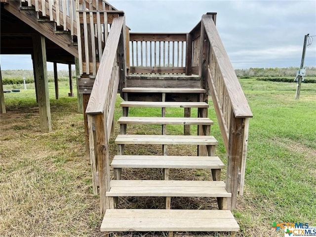 staircase featuring a rural view