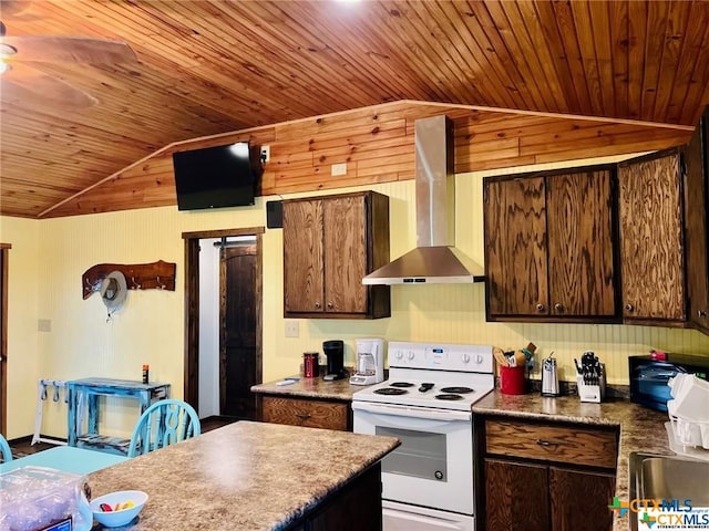 kitchen with electric stove, wall chimney range hood, lofted ceiling, and dark brown cabinetry