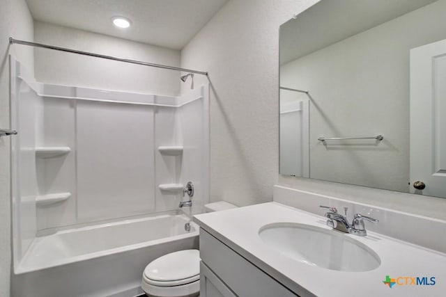 3644 Meteor Rd, New Braunfels, TX 78130 - full bath with a textured wall, toilet, recessed lighting, vanity, and  shower combination