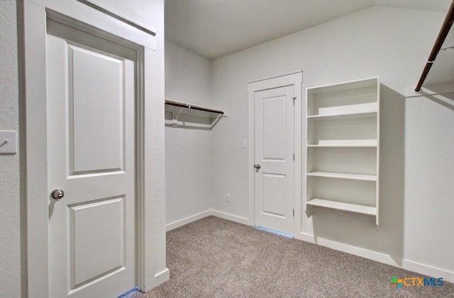 3644 Meteor Rd, New Braunfels, TX 78130 - walk in closet featuring carpet flooring