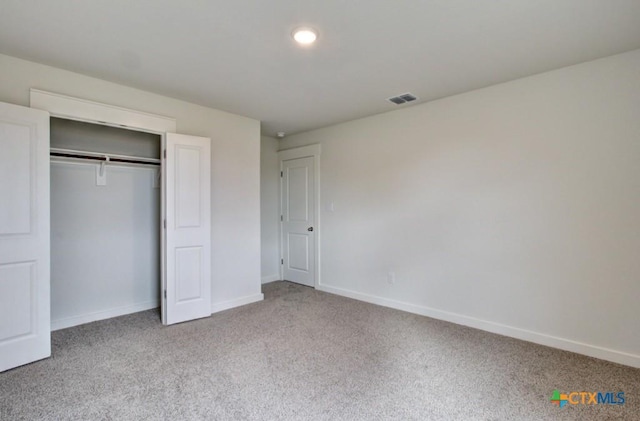 3644 Meteor Rd, New Braunfels, TX 78130 - unfurnished bedroom featuring a closet, visible vents, carpet floors, and baseboards