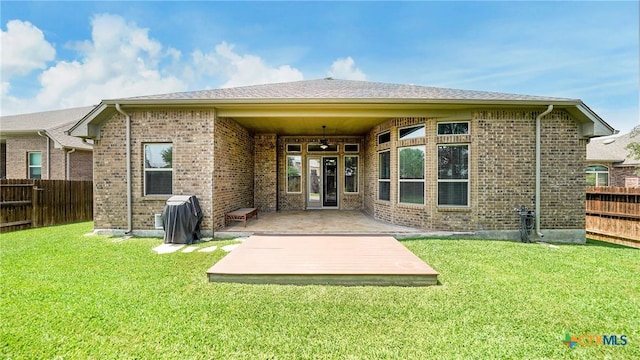 322 Wauford Way, New Braunfels, TX 78132 - back of house featuring ceiling fan, a patio area, and brick siding
