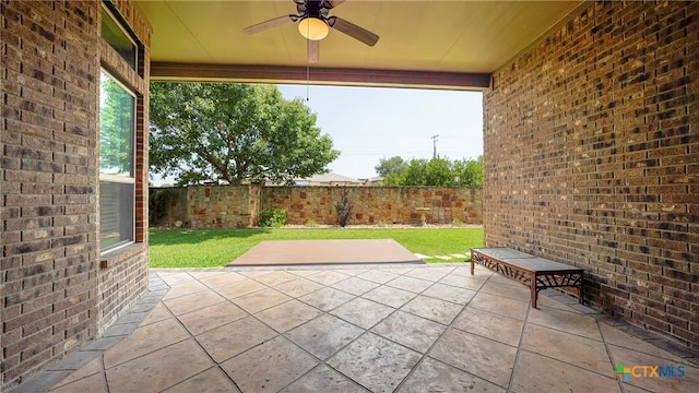 322 Wauford Way, New Braunfels, TX 78132 - fenced backyard with ceiling fan and a patio