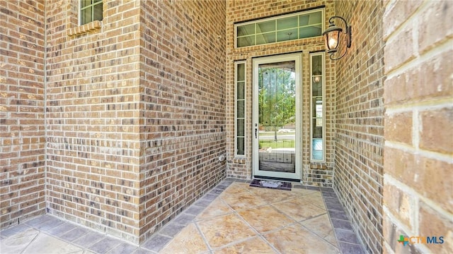 322 Wauford Way, New Braunfels, TX 78132 - property entrance featuring brick siding