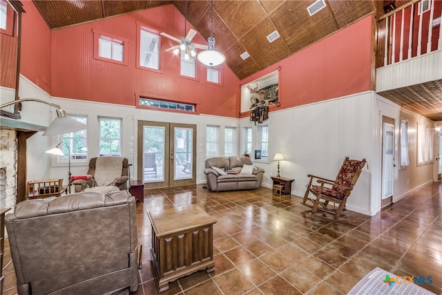 living area with wooden ceiling, french doors, and visible vents