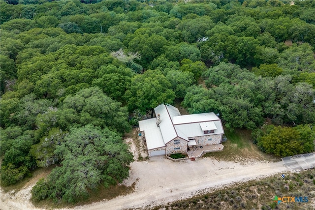 bird's eye view featuring a view of trees