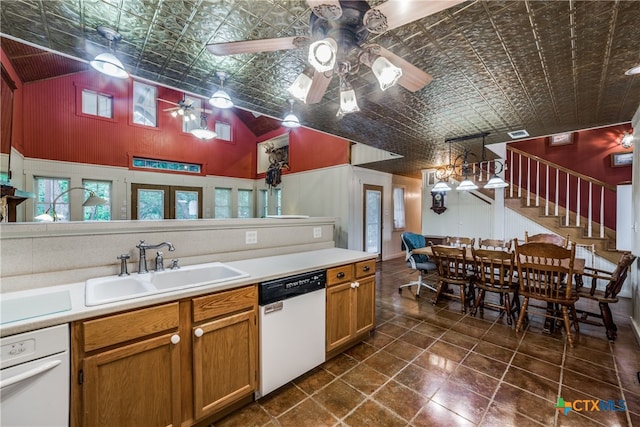 kitchen featuring brown cabinetry, white dishwasher, an ornate ceiling, ceiling fan, and a sink