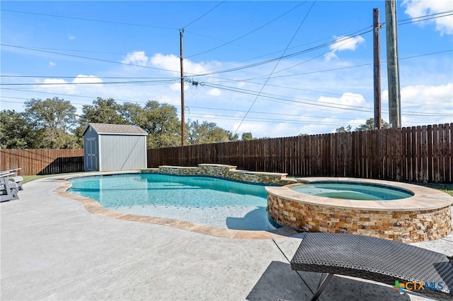 view of pool featuring a patio, a storage shed, and an in ground hot tub