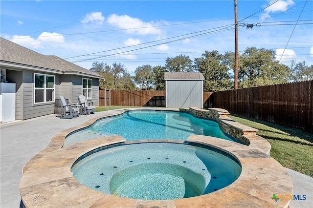 view of pool with a patio area, a storage shed, and an in ground hot tub