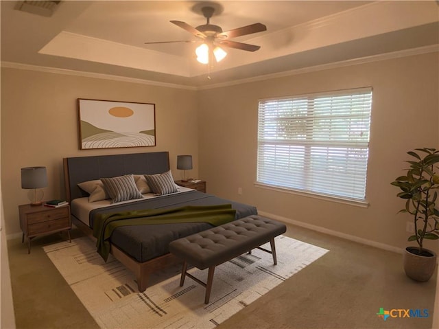505 Sun Meadows Dr, Harker Heights, TX 76548 - bedroom featuring a raised ceiling, light colored carpet, baseboards, ornamental molding, and ceiling fan