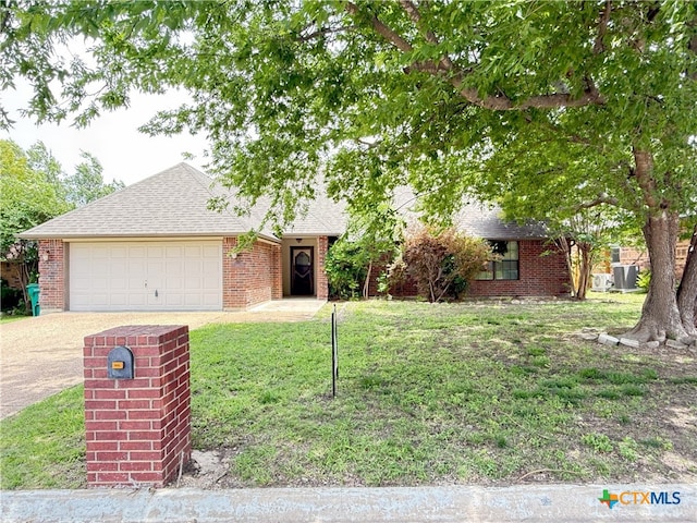 505 Sun Meadows Dr, Harker Heights, TX 76548 - obstructed view of property featuring brick siding, driveway, roof with shingles, and an attached garage