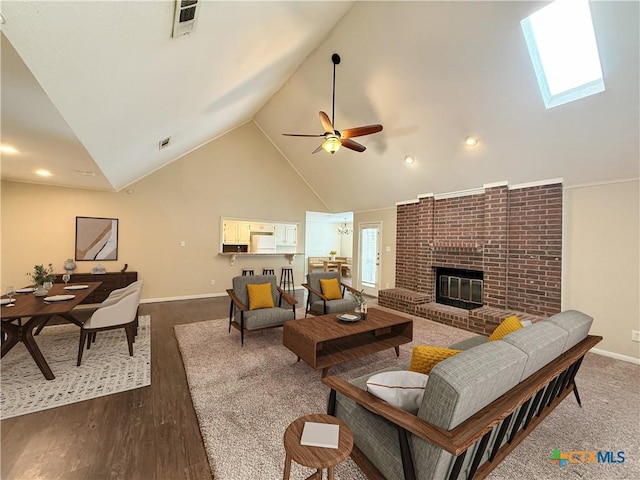 505 Sun Meadows Dr, Harker Heights, TX 76548 - living area with lofted ceiling, a fireplace, a ceiling fan, baseboards, and dark wood finished floors