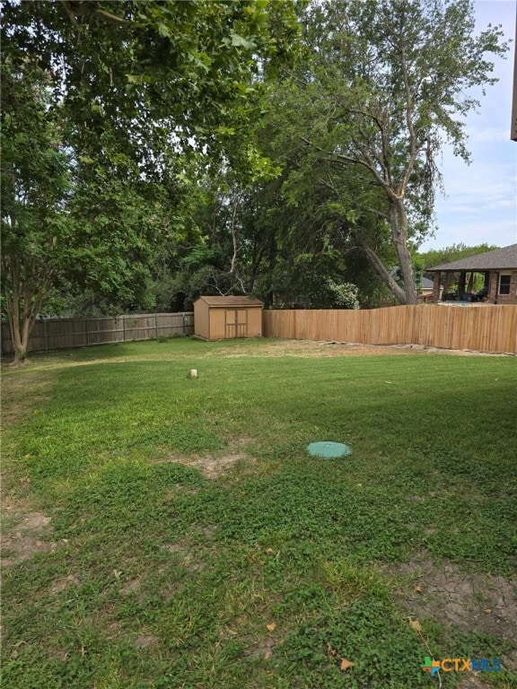 3506 Oakridge Blvd, Harker Heights, TX 76548 - fenced backyard with a storage shed