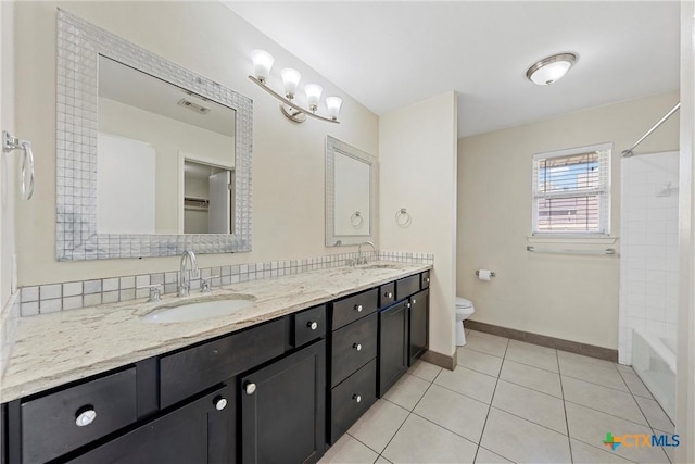 full bathroom featuring shower / tub combination, tile patterned flooring, vanity, and toilet