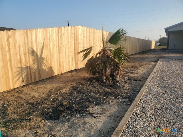 view of yard featuring fence