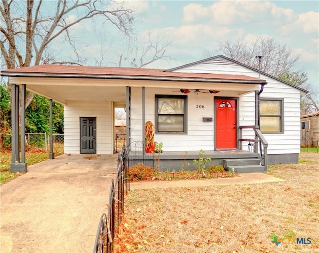 view of front of home featuring a carport