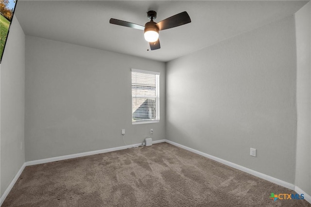 carpeted empty room with ceiling fan