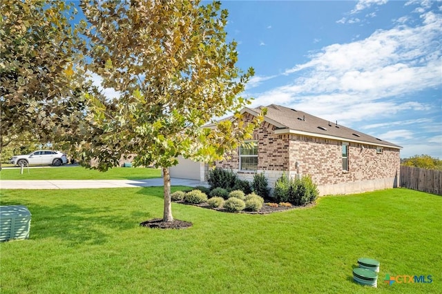 view of home's exterior featuring a yard