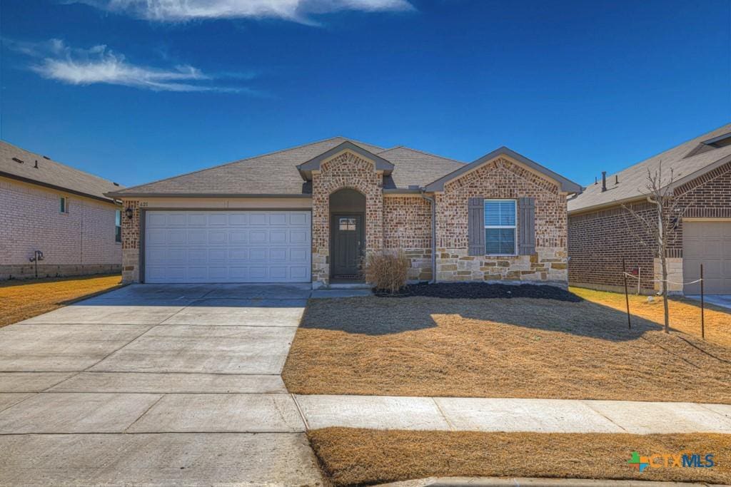 single story home with a garage