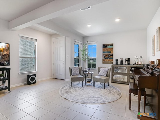 sitting room featuring light tile patterned floors