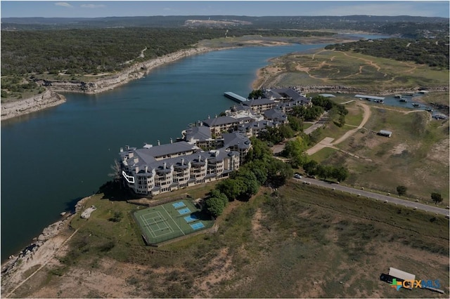 birds eye view of property featuring a water view