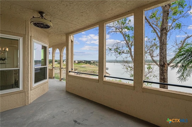 exterior space with a water view