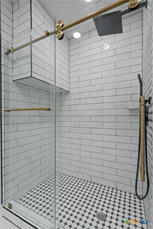 full bathroom with a shower stall