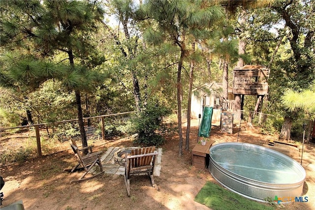 view of yard with a playground