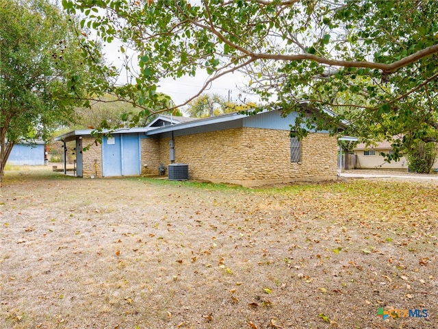 view of home's exterior featuring central AC