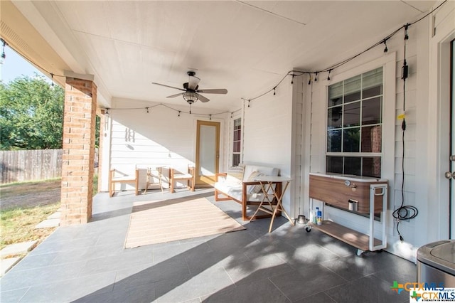 view of patio with ceiling fan