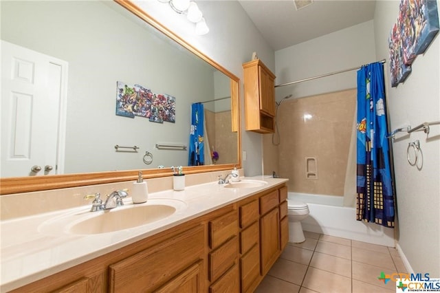 full bathroom with vanity, shower / bath combo with shower curtain, tile patterned floors, and toilet