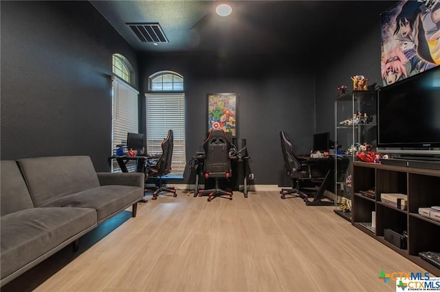 home office featuring hardwood / wood-style flooring