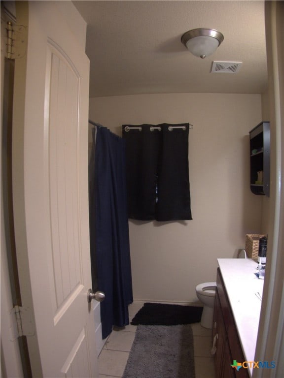 2726 Settlement Rd, Copperas Cove, TX 76522 - full bathroom with vanity, a shower with curtain, and tile patterned floors
