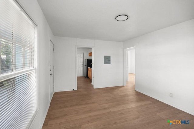 1404 Mulford St, Killeen, TX 76541 - spare room with light wood-type flooring and electric panel