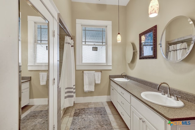 bathroom with vanity and tile patterned floors