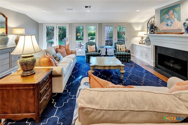 107 Spokane St, Victoria, TX 77904 - living room featuring ornamental molding and a fireplace with flush hearth