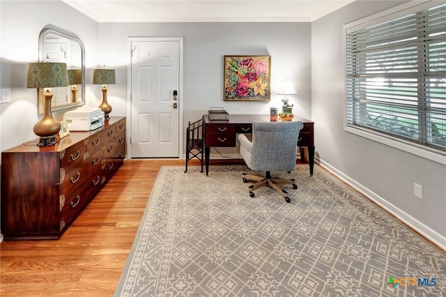 107 Spokane St, Victoria, TX 77904 - office with light wood-style floors, crown molding, and baseboards