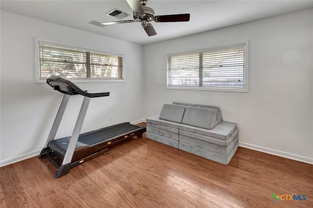 107 Spokane St, Victoria, TX 77904 - exercise room with wood finished floors, baseboards, and a ceiling fan