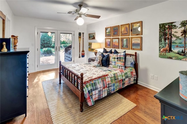 107 Spokane St, Victoria, TX 77904 - bedroom featuring french doors, access to outside, wood finished floors, and a ceiling fan