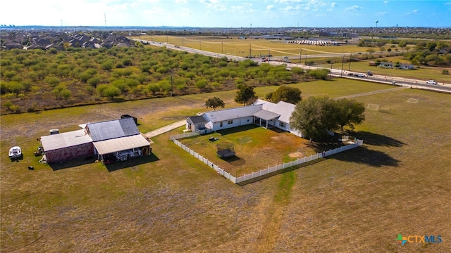 birds eye view of property featuring a rural view