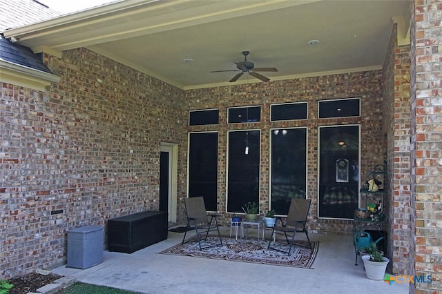 view of patio / terrace featuring ceiling fan