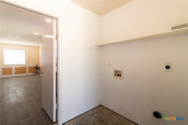 laundry area with hookup for a washing machine, hookup for an electric dryer, and dark hardwood / wood-style flooring