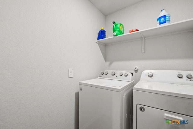 laundry room with separate washer and dryer