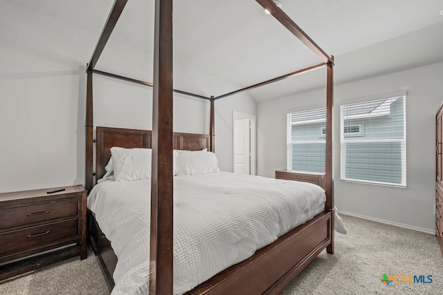 bedroom with light carpet