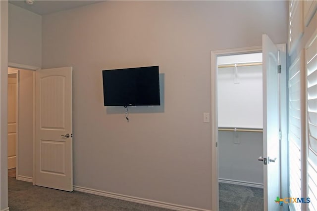 2734 Rock Rd, Troy, TX 76579 - unfurnished bedroom featuring carpet, a spacious closet, and a closet