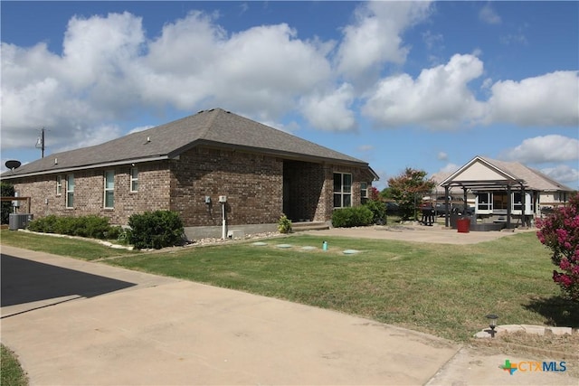 2734 Rock Rd, Troy, TX 76579 - view of front facade with brick siding and a front yard