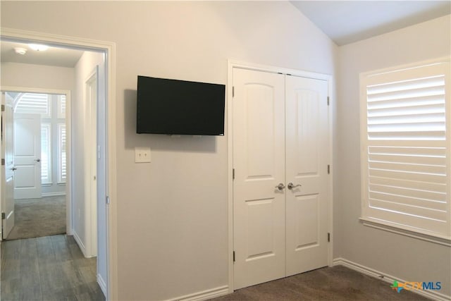 2734 Rock Rd, Troy, TX 76579 - unfurnished bedroom featuring a closet and dark wood-type flooring