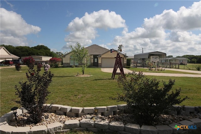 2734 Rock Rd, Troy, TX 76579 - view of front of home with driveway, a front lawn, and a garage