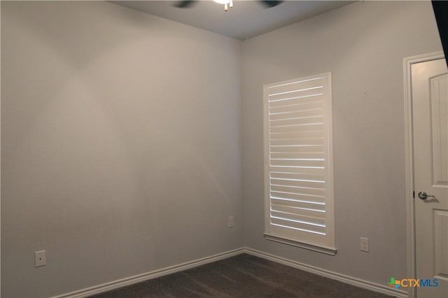 2734 Rock Rd, Troy, TX 76579 - unfurnished room featuring a ceiling fan and dark colored carpet
